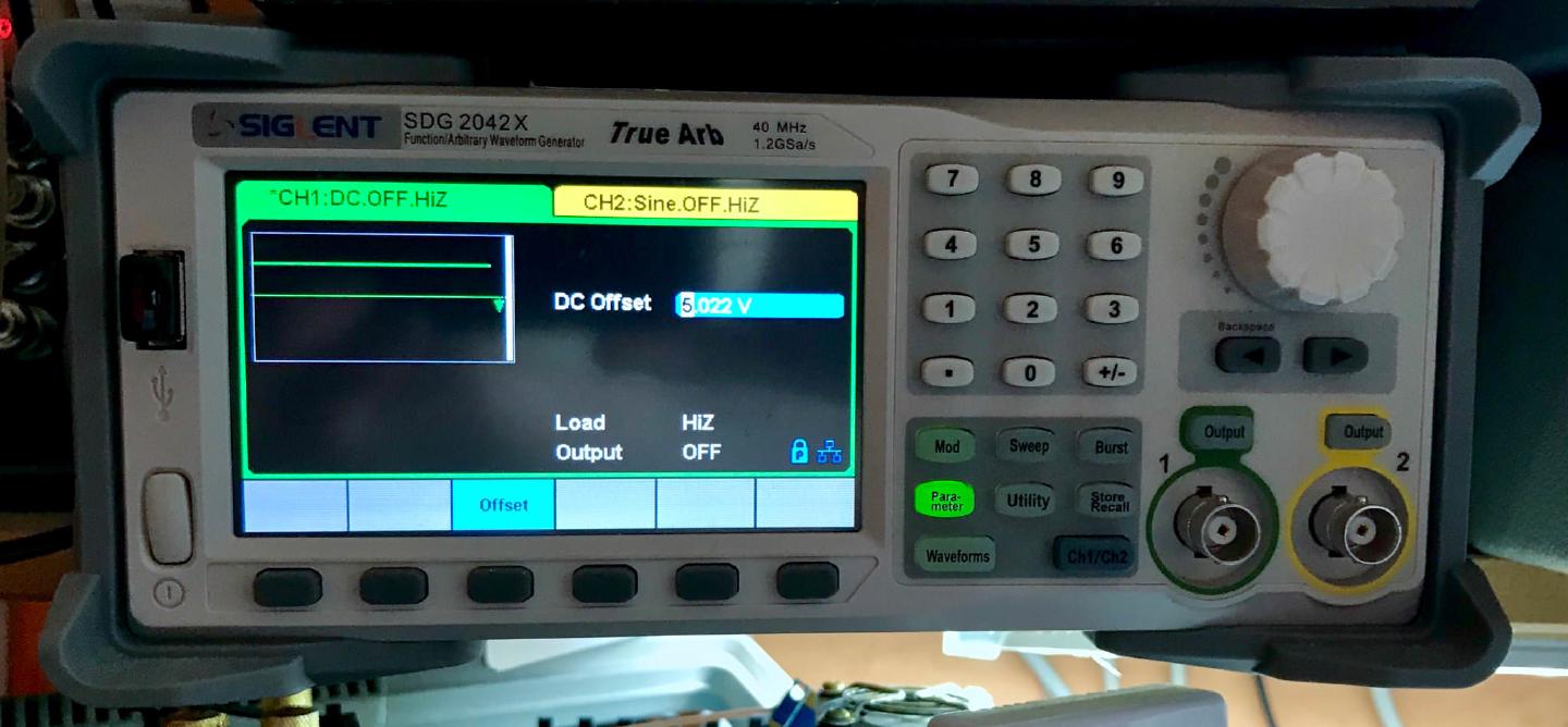 The Siglent SDG2042X used as a voltage source, its channel 1 DC offset set to 5.022 V into a high-impedance load
