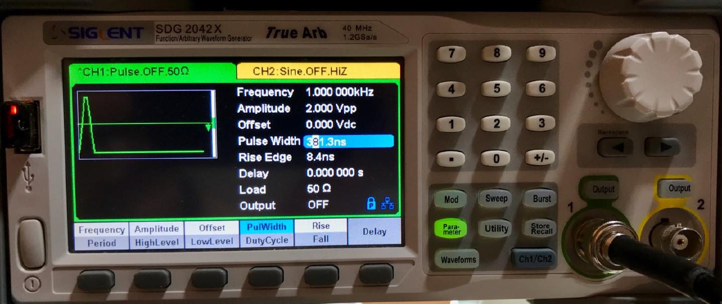 The Siglent SDG2042X set to a 1 kHz pulse, 2 Vpp, 381.3 ns wide with an 8.4 ns rise edge into a 50 ohm load