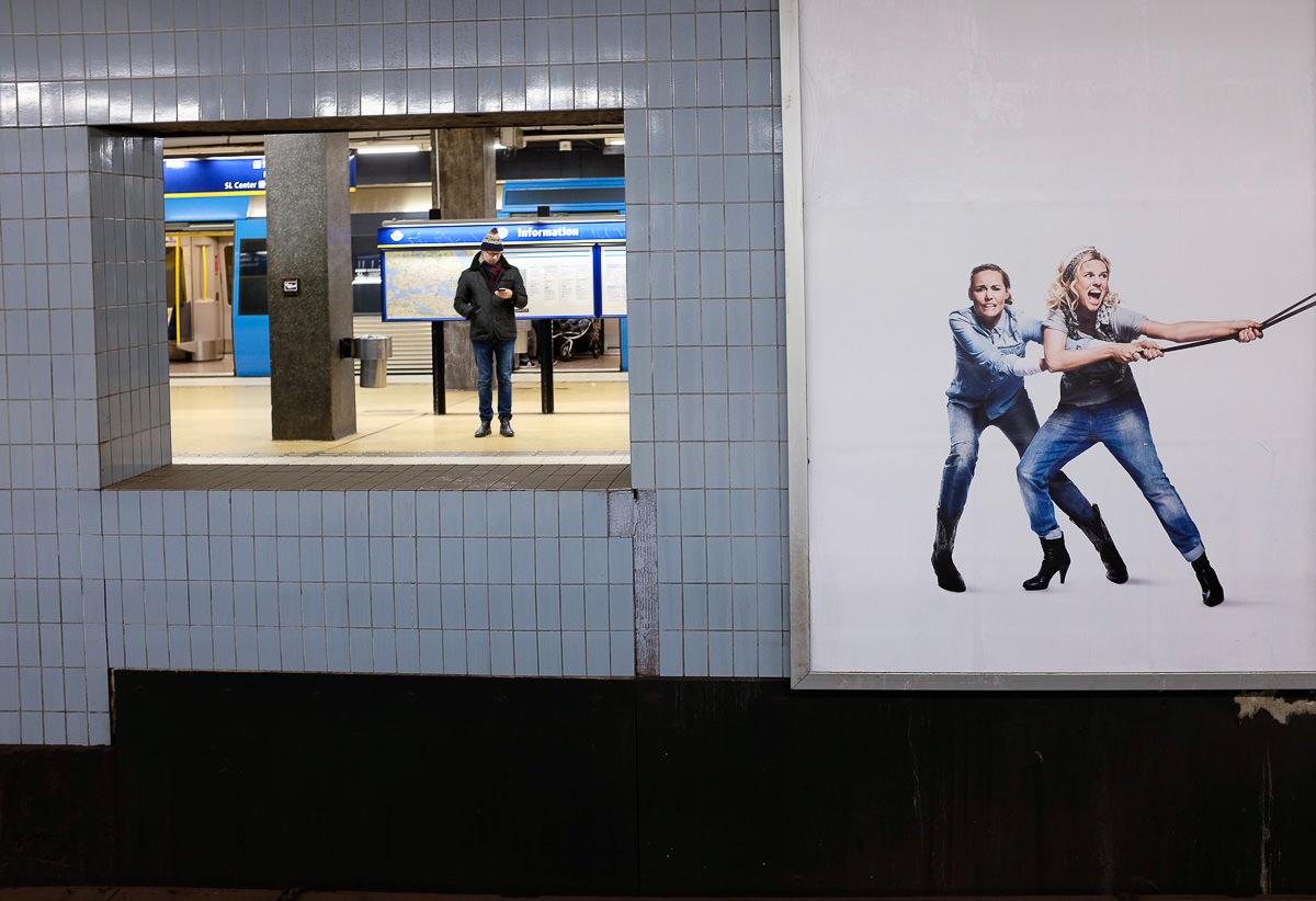 Subway ad two women pulling string