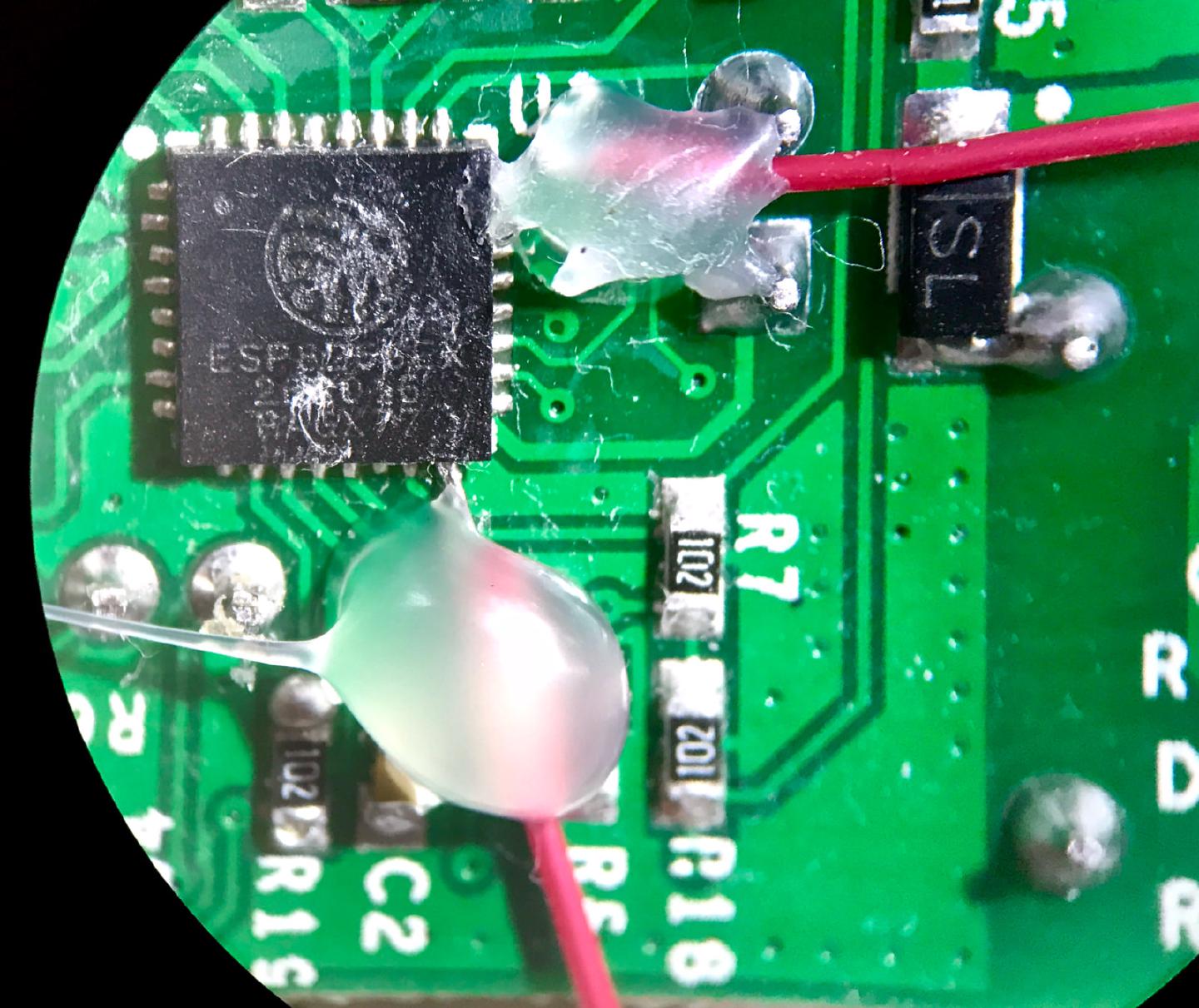 The GPIO4 and GPIO5 wires held to the board with blobs of hot glue so they cannot snap off the ESP8266 pins